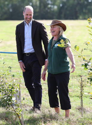 The Prince Of Wales Visits Monmouthshire And Herefordshire ABERGAVENNY, WALES - OCTOBER 01: Prince William, Prince Of Wales laughs with Kate Beavan from Great Tre-rhew Farm, a local farming family, who have partnered with the charity Stump Up For Trees, to use their land for upstream flooding interventions and the charity s goal of planting one million native trees across South Wales, at White Castle Farm on October 01, 2026 in Abergavenny, Wales. The Prince of Wales visited the region to meet with those tackling the threat of flooding caused by extreme weather conditions., Credit:Chris Jackson PA ROTA - B68 Avalon United Kingdom, Wales, Abergavenny Copyright: xChrisxJacksonx xPAxROTAx-xB68x xAvalonx 1139841015