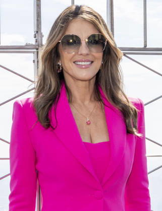 October 1, 2026, New York, New York, USA: ELIZABETH HURLEY visits the Empire State Building in New York to honor Breast Cancer Awareness Month and the Breast Cancer Campaign with The Estee Lauder Company. 1 October 2026 New York USA  - ZUMAa265 20261001_zep_a265_058 Copyright: xEricxAcquayex