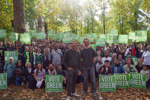 October 3, 2026, London, England, United Kingdom: Green Party leader ZACK POLANSKI and co-leader of the Scottish Green Party ROSS GREER stand with supporters in St Pancras Gardens as Zack Polanski continues his campaign ahead of the upcoming Holborn and St Pancras by-election. London United Kingdom - ZUMAv130 20261003_zip_v130_008 Copyright: xVukxValcicx