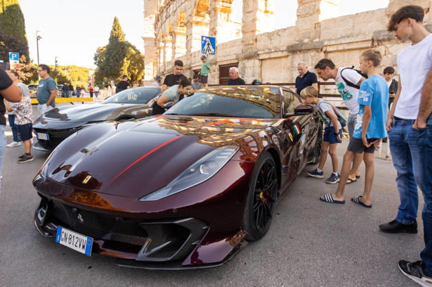 Ferrari Tour stops in Pula Luxury Ferrari sports cars taking part in a Ferrari Tour organized by Ineco Auto, are seen in front of the Roman Arena in Pula, Croatia, on October 3, 2026. While the drivers visit the ancient amphitheatre, local residents gather to watch and admire the vehicles.  SreckoxNiketic PIXSELL