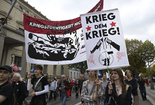 Thousands protest rearmament and conscription in Berlin BERLIN, GERMANY - OCTOBER 3: Thousands of people gather at the historic Brandenburg Gate to protest against rearmament, war and compulsory military service in Berlin, Germany, on October 3, 2026. The demonstrators, responding to a call by an initiative made up of various groups and political parties, later march through the city center. Halil Sagirkaya Anadolu Berlin Germany. Editorial use only. Please get in touch for any other usage.  Copyright: x2026xAnadoluxHalilxSagirkayax