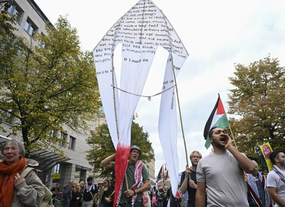 Thousands protest rearmament and conscription in Berlin BERLIN, GERMANY - OCTOBER 3: Thousands of people, including pro-Palestinian supporters, gather at the historic Brandenburg Gate to protest against rearmament, war and compulsory military service in Berlin, Germany, on October 3, 2026. The demonstrators, responding to a call by an initiative made up of various groups and political parties, later march through the city center. Halil Sagirkaya Anadolu Berlin Germany. Editorial use only. Please get in touch for any other usage.  Copyright: x2026xAnadoluxHalilxSagirkayax