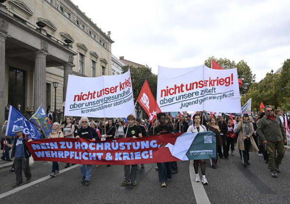 Thousands protest rearmament and conscription in Berlin BERLIN, GERMANY - OCTOBER 3: Thousands of people gather at the historic Brandenburg Gate to protest against rearmament, war and compulsory military service in Berlin, Germany, on October 3, 2026. The demonstrators, responding to a call by an initiative made up of various groups and political parties, later march through the city center. Halil Sagirkaya Anadolu Berlin Germany. Editorial use only. Please get in touch for any other usage.  Copyright: x2026xAnadoluxHalilxSagirkayax