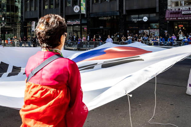 October 3, 2026, New York, New York, USA: 2026 NYC Korean Parade participants open a large Korean flag on Sixth Avenue. New York USA - ZUMAh214 20261003_znp_h214_001 Copyright: xSDxHerzogx