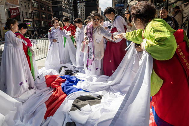 October 3, 2026, New York, New York, USA: 2026 NYC Korean Parade participants get their flags and outfits ready before it starts. New York USA - ZUMAh214 20261003_znp_h214_009 Copyright: xSDxHerzogx