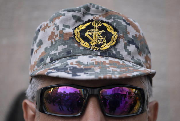 Opening Ceremony Of Second City-Square Military Training Camp A member of the Islamic Revolutionary Guard Corps (IRGC) stands guard during the opening ceremony of the second city-square military training camp for self-sacrificing forces in downtown Tehran, Iran, on October 3, 2026. The camp was established by the Basij paramilitary force, with personnel from the Islamic Republic of Iran Army responsible for training the volunteers. Tehran Tehran Iran  Copyright: xMortezaxNikoubazlx originalFilename: nikoubazl-openingc261003_np6Au.jpg