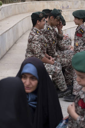 Opening Ceremony Of Second City-Square Military Training Camp Two veiled women converse while Iranian schoolboys wearing Iranian Army military uniforms speak with each other during the opening ceremony of the second city-square military training camp for self-sacrificing forces in downtown Tehran, Iran, on October 3, 2026. The camp was established by the Basij paramilitary force, with personnel from the Islamic Republic of Iran Army responsible for training the volunteers. Tehran Tehran Iran  Copyright: xMortezaxNikoubazlx originalFilename: nikoubazl-openingc261003_npbd1.jpg