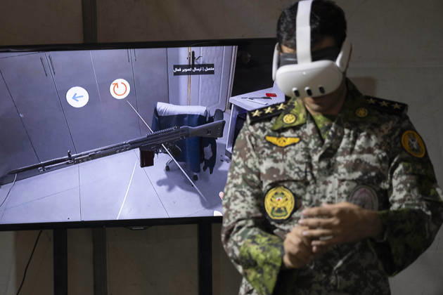 Opening Ceremony Of Second City-Square Military Training Camp An Iranian Army serviceman wears a virtual reality headset to shoot with a virtual rifle during the opening ceremony of the second city-square military training camp for self-sacrificing forces in downtown Tehran, Iran, on October 3, 2026. The camp was established by the Basij paramilitary force, with personnel from the Islamic Republic of Iran Army responsible for training the volunteers. Tehran Tehran Iran  Copyright: xMortezaxNikoubazlx originalFilename: nikoubazl-openingc261003_npkJa.jpg