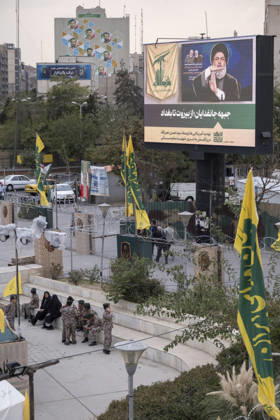 Opening Ceremony Of Second City-Square Military Training Camp Iranian schoolboys wearing military uniforms gather beneath a portrait of Hassan Nasrallah, the late secretary general of Lebanon s Hezbollah, as they prepare to take part in the opening ceremony of the second city-square military training camp for self-sacrificing forces in downtown Tehran, Iran, on October 3, 2026. The camp was established by the Basij paramilitary force, with personnel from the Islamic Republic of Iran Army responsible for training the volunteers. Tehran Tehran Iran  Copyright: xMortezaxNikoubazlx originalFilename: nikoubazl-openingc261003_nplnR.jpg