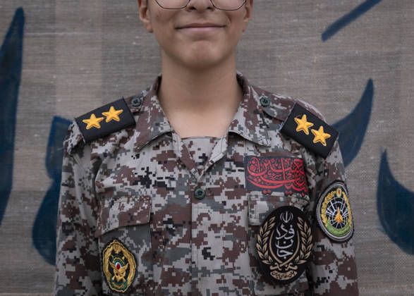 Opening Ceremony Of Second City-Square Military Training Camp An Iranian schoolboy wearing an Iranian Army military uniform smiles while standing at attention during the opening ceremony of the second city-square military training camp for self-sacrificing forces in downtown Tehran, Iran, on October 3, 2026. The camp was established by the Basij paramilitary force, with personnel from the Islamic Republic of Iran Army responsible for training the volunteers. Tehran Tehran Iran  Copyright: xMortezaxNikoubazlx originalFilename: nikoubazl-openingc261003_npMff.jpg