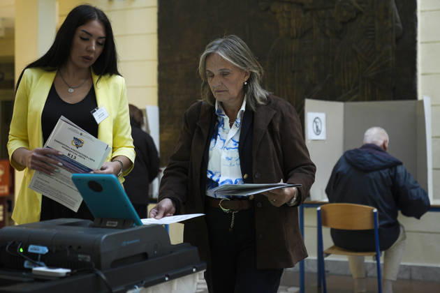 Voters cast ballots in Sarajevo as Bosnia and Herzegovina holds general elections SARAJEVO, BOSNIA AND HERZEGOVINA - OCTOBER 04: Voters cast their ballots as polling stations open for the 2026 General Elections in Sarajevo, Bosnia and Herzegovina on October 04, 2026. The nationwide vote features the inaugural use of new electoral technologies, including biometric voter identification, optical ballot scanners, and automated result transmission systems. Citizens are voting to elect members of the tripartite Presidency of Bosnia and Herzegovina, deputies to the Parliamentary Assembly, the Federation of BiH Parliament, the President and Vice Presidents of Republika Srpska, the National Assembly of Republika Srpska, and cantonal assemblies. Sami Copyright: x2026xAnadoluxSamirxJordamovicx