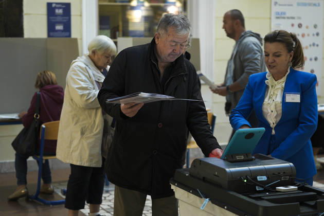 Voters cast ballots in Sarajevo as Bosnia and Herzegovina holds general elections SARAJEVO, BOSNIA AND HERZEGOVINA - OCTOBER 04: Voters cast their ballots as polling stations open for the 2026 General Elections in Sarajevo, Bosnia and Herzegovina on October 04, 2026. The nationwide vote features the inaugural use of new electoral technologies, including biometric voter identification, optical ballot scanners, and automated result transmission systems. Citizens are voting to elect members of the tripartite Presidency of Bosnia and Herzegovina, deputies to the Parliamentary Assembly, the Federation of BiH Parliament, the President and Vice Presidents of Republika Srpska, the National Assembly of Republika Srpska, and cantonal assemblies. Sami Copyright: x2026xAnadoluxSamirxJordamovicx