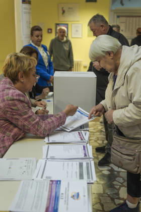 Voters cast ballots in Sarajevo as Bosnia and Herzegovina holds general elections SARAJEVO, BOSNIA AND HERZEGOVINA - OCTOBER 04: Voters cast their ballots as polling stations open for the 2026 General Elections in Sarajevo, Bosnia and Herzegovina on October 04, 2026. The nationwide vote features the inaugural use of new electoral technologies, including biometric voter identification, optical ballot scanners, and automated result transmission systems. Citizens are voting to elect members of the tripartite Presidency of Bosnia and Herzegovina, deputies to the Parliamentary Assembly, the Federation of BiH Parliament, the President and Vice Presidents of Republika Srpska, the National Assembly of Republika Srpska, and cantonal assemblies. Sami Copyright: x2026xAnadoluxSamirxJordamovicx