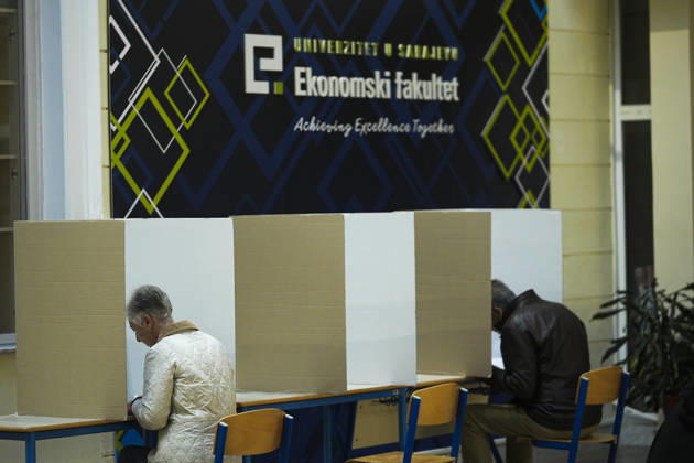Voters cast ballots in Sarajevo as Bosnia and Herzegovina holds general elections SARAJEVO, BOSNIA AND HERZEGOVINA - OCTOBER 04: Voters cast their ballots as polling stations open for the 2026 General Elections in Sarajevo, Bosnia and Herzegovina on October 04, 2026. The nationwide vote features the inaugural use of new electoral technologies, including biometric voter identification, optical ballot scanners, and automated result transmission systems. Citizens are voting to elect members of the tripartite Presidency of Bosnia and Herzegovina, deputies to the Parliamentary Assembly, the Federation of BiH Parliament, the President and Vice Presidents of Republika Srpska, the National Assembly of Republika Srpska, and cantonal assemblies. Sami Copyright: x2026xAnadoluxSamirxJordamovicx
