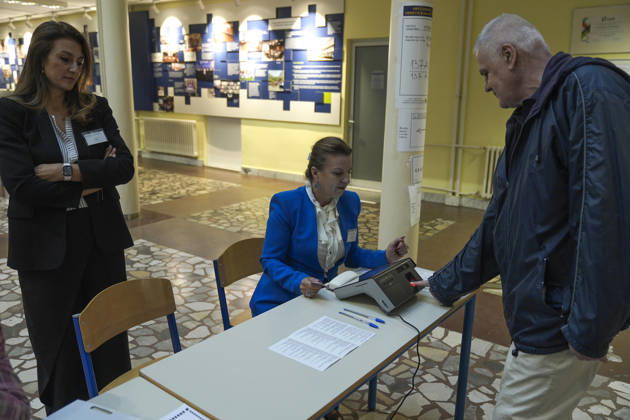Voters cast ballots in Sarajevo as Bosnia and Herzegovina holds general elections SARAJEVO, BOSNIA AND HERZEGOVINA - OCTOBER 04: Voters cast their ballots as polling stations open for the 2026 General Elections in Sarajevo, Bosnia and Herzegovina on October 04, 2026. The nationwide vote features the inaugural use of new electoral technologies, including biometric voter identification, optical ballot scanners, and automated result transmission systems. Citizens are voting to elect members of the tripartite Presidency of Bosnia and Herzegovina, deputies to the Parliamentary Assembly, the Federation of BiH Parliament, the President and Vice Presidents of Republika Srpska, the National Assembly of Republika Srpska, and cantonal assemblies. Sami Copyright: x2026xAnadoluxSamirxJordamovicx