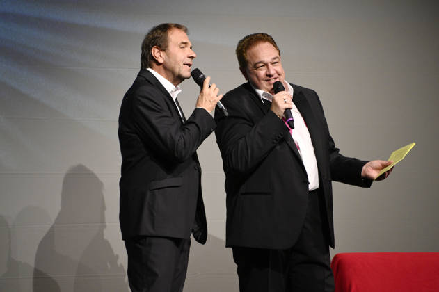 Peter Rütten und Oliver Kalkofe bei der Weltpremiere der ersten Folge der neuen SchleFaZ-Staffel auf Großbildleinwand Geisterjäger John Sinclair - Die Dämonenhochzeit im Ernst-Reuter-Saal. Berlin, 03.10.2026