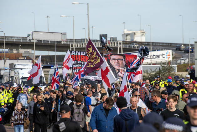 October 3, 2026, Dover, United Kingdom: Far-right protesters march with banner and flags near the harbour during a demonstration in Dover. Supporters of the English Defence League (EDL) gathered in Dover, UK to march through the town all the way to the harbour. English Defence League is an extreme far-right and Islamophobic organisation. It was founded by Tommy Robinson (pseudonym of Steven Yaxley-Lennon) in 2009. Dover United Kingdom - ZUMAs197 20261003_aaa_s197_249 Copyright: xKrisztianxElekx