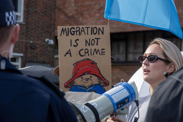 October 3, 2026, Dover, United Kingdom: An antifascist protester holds a placard during a counter-protest in Dover. Supporters of the English Defence League (EDL) gathered in Dover, UK to march through the town all the way to the harbour. English Defence League is an extreme far-right and Islamophobic organisation. It was founded by Tommy Robinson (pseudonym of Steven Yaxley-Lennon) in 2009. Dover United Kingdom - ZUMAs197 20261003_aaa_s197_258 Copyright: xKrisztianxElekx