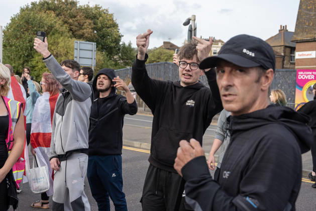 October 3, 2026, Dover, United Kingdom: Far-right protesters show gestures to the antifascist counter-protesters during a demonstration in Dover. Supporters of the English Defence League (EDL) gathered in Dover, UK to march through the town all the way to the harbour. English Defence League is an extreme far-right and Islamophobic organisation. It was founded by Tommy Robinson (pseudonym of Steven Yaxley-Lennon) in 2009. Dover United Kingdom - ZUMAs197 20261003_aaa_s197_259 Copyright: xKrisztianxElekx