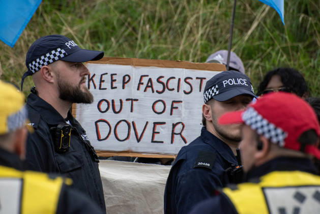 October 3, 2026, Dover, United Kingdom: An antifascist protester holds a placard during a counter-protest in Dover. Supporters of the English Defence League (EDL) gathered in Dover, UK to march through the town all the way to the harbour. English Defence League is an extreme far-right and Islamophobic organisation. It was founded by Tommy Robinson (pseudonym of Steven Yaxley-Lennon) in 2009. Dover United Kingdom - ZUMAs197 20261003_aaa_s197_267 Copyright: xKrisztianxElekx