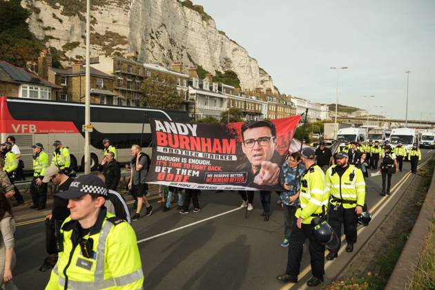 October 3, 2026, Dover, United Kingdom of Great Britain and Northern Ireland: DOVER, UNITED KINGDOM, OCTOBER 3, 2026: Anti-immigration protesters and anti-racism counter-protesters gather during rival demonstrations in Dover, Kent. Anti-immigration demonstrators carrying Union flags and St George s flags displayed banners calling for deportations and an end to small-boat crossings, while counter-protesters gathered nearby. Police maintained a significant presence between the groups and monitored the demonstrations. Dover United Kingdom of Great Britain and Northern Ireland - ZUMAq101 20261003_zna_q101_210 Copyright: xMarcxLewisx