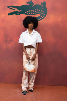 PFW Lacoste - Photocall LZ John Glacier attends the Lacoste Womenswear Spring Summer 2027 show as part of Paris Fashion Week on October 4, 2026 at Roland Garros in Paris, France. Photo by Laurent Zabulon ABACAPRESS.COM  Copyright: xZabulonxLaurent ABACAx