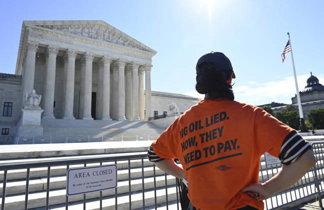 Supreme Court Hears Major Climate Case Against Oil Companies People protest in front of the US Supreme Court as the court considers the Suncor v. Boulder case in Washington, DC, on October 5, 2026. The justices are considering whether states and localities can try to hold oil companies responsible for damages from climate change. If Boulder, Colo., wins, the companies could owe enormous sums.Photo by Olivier Douliery ABACAPRESS.COM Washington DC United States  Copyright: xDoulieryxOlivier ABACAx