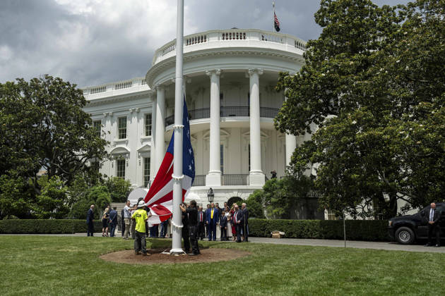 October 5, 2026, Washington, Dc, United States of America: An American flag is raised on a newly installed flagpole on the South Lawn of the White House as U.S. President Donald Trump, family members and guests look on, June 18, 2025 in Washington, D.C. The flag was raised on one of two new flagpoles Trump had installed on the North and South Lawns of the White House, which he said he paid for personally. Washington United States of America - ZUMAp138 20261005_zaa_p138_088 Copyright: xDanielxTorok WhitexHousex