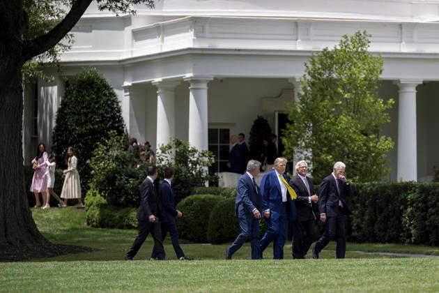 October 5, 2026, Washington, Dc, United States of America: U.S. President Donald Trump walks with guests across the South Lawn of the White House for a flag raising on a newly installed flagpole, June 18, 2025 in Washington, D.C. The flag was raised on one of two new flagpoles Trump had installed on the North and South Lawns of the White House, which he said he paid for personally. Washington United States of America - ZUMAp138 20261005_zaa_p138_079 Copyright: xMollyxRiley WhitexHousex