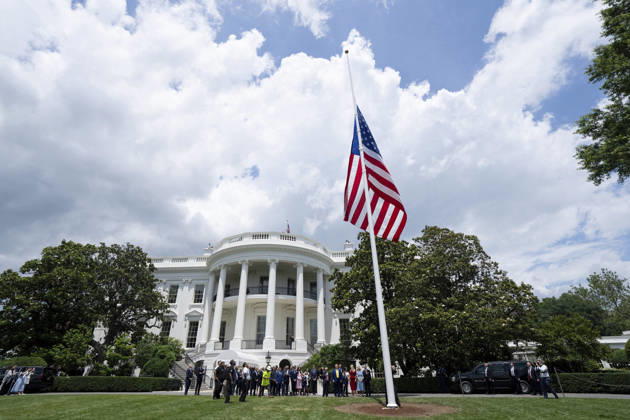October 5, 2026, Washington, Dc, United States of America: An American flag flies from a newly installed flagpole on the South Lawn of the White House as guests gather below, June 18, 2025 in Washington, D.C. The flag was raised on one of two new flagpoles Trump had installed on the North and South Lawns of the White House, which he said he paid for personally. Washington United States of America - ZUMAp138 20261005_zaa_p138_051 Copyright: xAndreaxHanks WhitexHousex