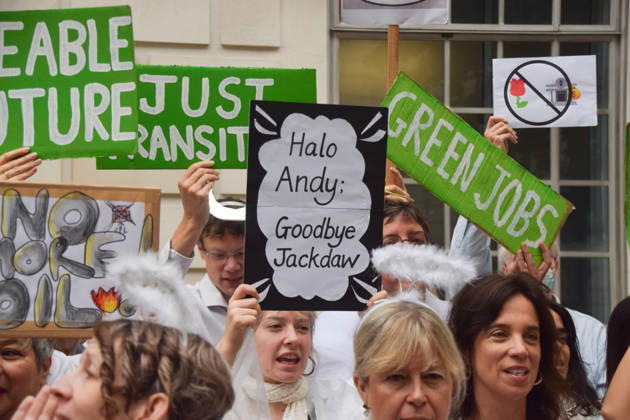 October 6, 2026, London, England, United Kingdom: Activists from the climate action group Fossil Free London staged a protest against the Rosebank oil field and the Jackdaw gas field outside the Department for Energy Security and Net Zero. Activists dressed as angels urged a protester wearing an Andy Burnham mask to stop the fossil fuel projects in the North Sea while activists dressed as demons urged him to drill for more oil. London United Kingdom  - ZUMAv130 20261006_zip_v130_008 Copyright: xVukxValcicx