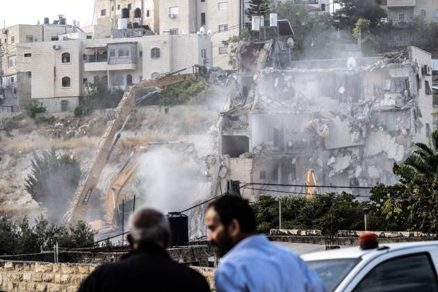 Israeli minister Ben-Gvir poses on bulldozer during demolition of Palestinian home in Jerusalem JERUSALEM - OCTOBER 06: Israeli far-right National Security Minister Itamar Ben-Gvir poses on a bulldozer after taking part in the demolition of a five-story building belonging to Palestinians in East Jerusalem on October 06, 2026. Israeli forces began demolishing the five-story building in the Tur neighborhood with bulldozers in the morning hours. Israeli forces took security measures in the area. Mostafa Alkharouf Anadolu Jerusalem Israel. Editorial use only. Please get in touch for any other usage.  Copyright: x2026xAnadoluxMostafaxAlkharoufx