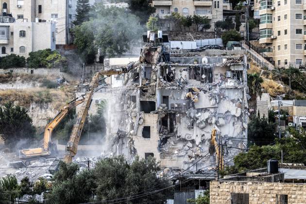 Israeli minister Ben-Gvir poses on bulldozer during demolition of Palestinian home in Jerusalem JERUSALEM - OCTOBER 06: Israeli far-right National Security Minister Itamar Ben-Gvir poses on a bulldozer after taking part in the demolition of a five-story building belonging to Palestinians in East Jerusalem on October 06, 2026. Israeli forces began demolishing the five-story building in the Tur neighborhood with bulldozers in the morning hours. Israeli forces took security measures in the area. Mostafa Alkharouf Anadolu Jerusalem Israel. Editorial use only. Please get in touch for any other usage.  Copyright: x2026xAnadoluxMostafaxAlkharoufx