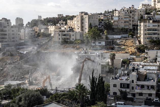 Israeli minister Ben-Gvir poses on bulldozer during demolition of Palestinian home in Jerusalem JERUSALEM - OCTOBER 06: Israeli far-right National Security Minister Itamar Ben-Gvir poses on a bulldozer after taking part in the demolition of a five-story building belonging to Palestinians in East Jerusalem on October 06, 2026. Israeli forces began demolishing the five-story building in the Tur neighborhood with bulldozers in the morning hours. Israeli forces took security measures in the area. Mostafa Alkharouf Anadolu Jerusalem Israel. Editorial use only. Please get in touch for any other usage.  Copyright: x2026xAnadoluxMostafaxAlkharoufx