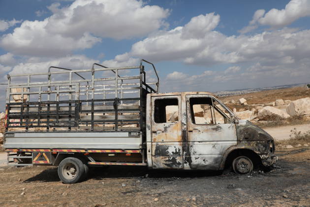 Palestinian Inspects Burned Vehicles Near al-Samu South of Hebron A Palestinian man inspects his burned vehicles near the town of al-Samu, south of Hebron, in the West Bank, on October 6, 2026, after an apparent arson attack believed to have been carried out by Israeli settlers. The incident comes amid an increase in settler attacks on Palestinians and their property in different areas of the West Bank. Photo by Mamoun Wazwaz apaimages Hebron West Bank Palestinian Territory 061026_Hebron_MW_00(19) Copyright: xapaimagesxMamounxWazwazx xapaimagesx