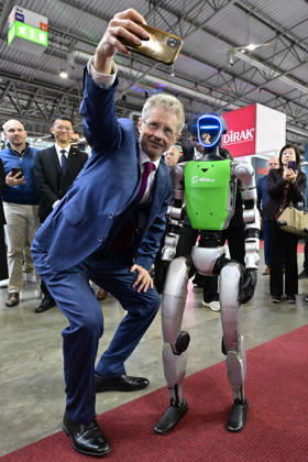Czech Senate President Milos Vystrcil takes a selfie with a humanoid robot at opening of the 67th International Engineering Fair, which begins at Vystaviste 1 exhibition grounds in Brno, Czech Republic, on October 6th, 2026. International Fair of Machine Tools and Forming Machines IMT, International Welding Engineering Fair Welding, International Fair of Plastics, Rubber and Composites Plastex, International Fair of Surface Treatment Technologies Profintech and International Foundry Fair Fond-Ex also start. (CTKxPhoto VaclavxSalek) CTKPhotoP2026100605272  CTKPhotoP2026100605272