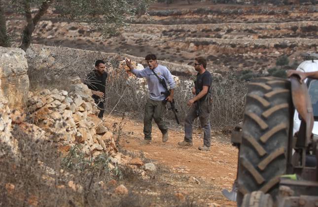 October 6, 2026, Aqraba, Palestine, State of: AQRABA, OCCUPIED WEST BANK, OCTOBER 6, 2026: Palestinian farmers come under attack by Israeli settlers while harvesting olives in the village of Aqraba, south of Nablus. Several Palestinians were wounded after settlers opened fire and assaulted farmers during the harvest, according to Palestinian reports. Israeli forces later detained a Palestinian farmer at the scene, according to information provided by the photographer. The Israeli military had not immediately commented on the reported shooting. Aqraba Palestine, State of - ZUMAq101 20261006_zna_q101_068 Copyright: xNedalxShtiehx