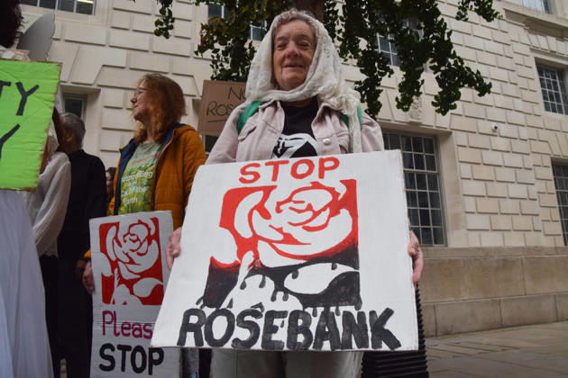 October 6, 2026, London, England, United Kingdom: Activists gather outside the Department for Energy Security and Net Zero during a protest by the climate action group Fossil Free London against the Rosebank oil field and the Jackdaw gas field. London United Kingdom  - ZUMAv130 20261006_zip_v130_050 Copyright: xVukxValcicx