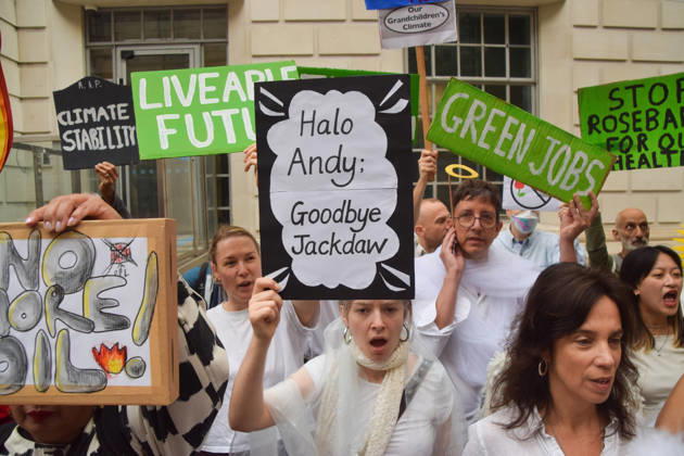 October 6, 2026, London, England, United Kingdom: Activists gather outside the Department for Energy Security and Net Zero during a protest by the climate action group Fossil Free London against the Rosebank oil field and the Jackdaw gas field. London United Kingdom  - ZUMAv130 20261006_zip_v130_053 Copyright: xVukxValcicx
