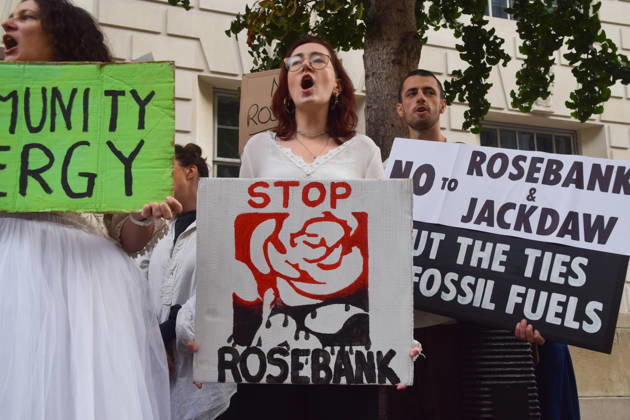 October 6, 2026, London, England, United Kingdom: Activists gather outside the Department for Energy Security and Net Zero during a protest by the climate action group Fossil Free London against the Rosebank oil field and the Jackdaw gas field. London United Kingdom  - ZUMAv130 20261006_zip_v130_057 Copyright: xVukxValcicx