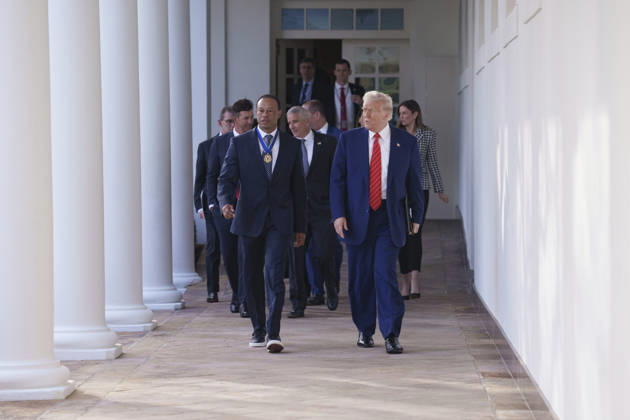 October 6, 2026, Washington, Dc, United States of America: U.S. President Donald Trump walks with golfer Tiger Woods along the West Colonnade of the White House before a reception honoring Black History Month, February 20, 2025 in Washington, D.C. Woods, who received the Presidential Medal of Freedom from Trump in 2019, joined PGA Tour leaders at the White House for talks on a proposed deal with Saudi ArabiaÃ¢â‚¬â ¢s Public Investment Fund before Trump introduced him as a surprise guest at a Black History Month reception. Washington United States of America - ZUMAp138 20261006_zaa_p138_001 Copyright: xJoycexBoghosian WhitexHousex