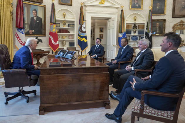 October 6, 2026, Washington, Dc, United States of America: U.S. President Donald Trump meets with golfer Tiger Woods and PGA Tour leaders at the Resolute Desk in the Oval Office of the White House, February 20, 2025 in Washington, D.C. Woods, who received the Presidential Medal of Freedom from Trump in 2019, joined PGA Tour leaders at the White House for talks on a proposed deal with Saudi ArabiaÃ¢â‚¬â ¢s Public Investment Fund before Trump introduced him as a surprise guest at a Black History Month reception. Washington United States of America - ZUMAp138 20261006_zaa_p138_003 Copyright: xJoycexN.xBoghosian WhitexHousex
