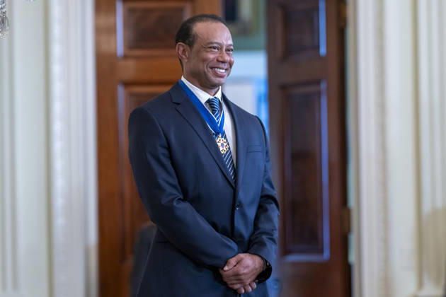 October 6, 2026, Washington, Dc, United States of America: Golfer Tiger Woods smiles as he is introduced by U.S. President Donald Trump at a reception honoring Black History Month in the East Room of the White House, February 20, 2025 in Washington, D.C. Trump introduced golfer Tiger Woods as a surprise guest at the reception in the East Room, where he praised Woods as one of the greatest athletes of all time. Washington United States of America - ZUMAp138 20261006_zaa_p138_014 Copyright: xMollyxRiley WhitexHousex