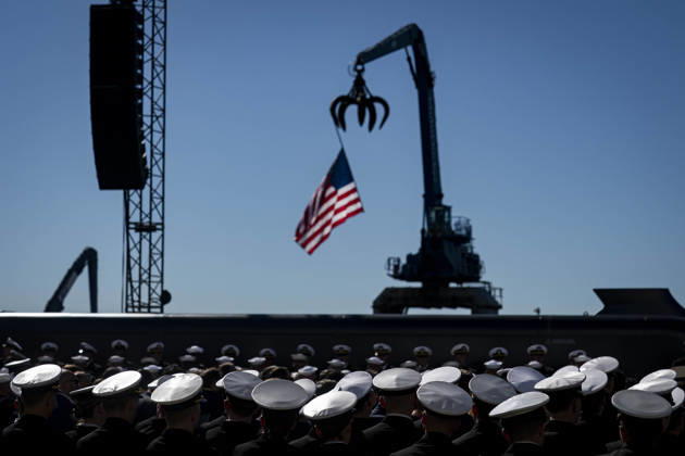 Members of the Navy listen during an event at Tradepoint Atlantic in Sparrows Point, Maryland on Tuesday, Oct. 6, 2026. Anduril is in advanced talks to build an autonomous surface-vessel factory at Tradepoint Atlantic, which would give the company an East Coast hub alongside its Foss Maritime shipyard in Seattle and undersea-vehicle factory at Quonset Business Park in Rhode Island.  BAL20261006105 AlxDrago