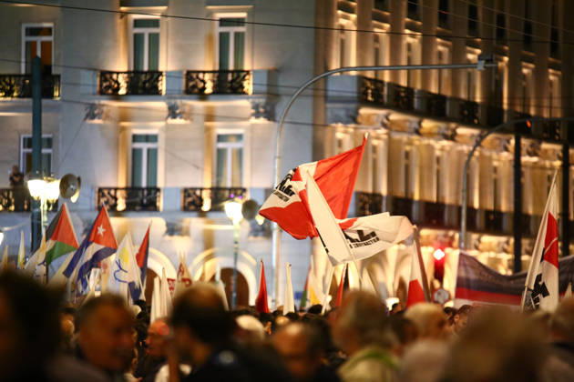 October 6, 2026, Athens, Attica, GREECE: Flags are raised above demonstrators during an anti-war protest opposing the visit of US Secretary of State MARCO RUBIO. Athens GREECE - ZUMAx103 20261006_zip_x103_003 Copyright: xHarrisxXanthopoulosx
