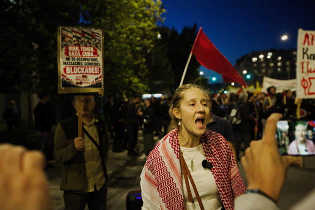 October 6, 2026, Athens, Attica, GREECE: A protester wearing a Palestinian keffiyeh is being interviewed during an anti-war demonstration opposing the visit of US Secretary of State MARCO RUBIO. Athens GREECE - ZUMAx103 20261006_zip_x103_020 Copyright: xHarrisxXanthopoulosx