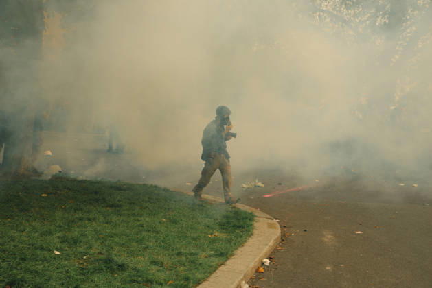 Paris Students Protest Education Conditions A demonstrator moves through dense tear gas along the edge of a grassy area in Paris, France, on October 6, 2026. France s Interior Ministry said 256,000 people marched nationwide, including 56,000 in Paris, during the student-led day of action over school conditions. High school students called for more education funding and staff, smaller classes and improved facilities, with teachers, parents and unions joining demonstrations. Paris Ile de France France Copyright: xDavoodxMaeilix