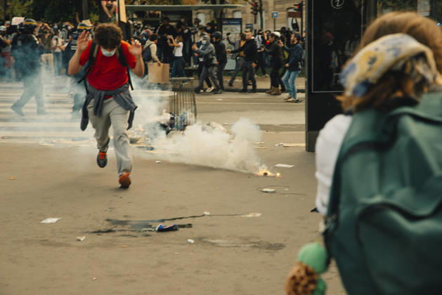 Paris Students Protest Education Conditions A demonstrator runs past a smoking tear gas canister in an open square in Paris, France, on October 6, 2026. France s Interior Ministry said 256,000 people marched nationwide, including 56,000 in Paris, during the student-led day of action over school conditions. High school students called for more education funding and staff, smaller classes and improved facilities, with teachers, parents and unions joining demonstrations. Paris Ile de France France Copyright: xDavoodxMaeilix
