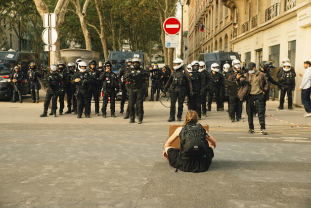 Paris Students Protest Education Conditions A seated demonstrator faces a line of riot police blocking a street in Paris, France, on October 6, 2026. France s Interior Ministry said 256,000 people marched nationwide, including 56,000 in Paris, during the student-led day of action over school conditions. High school students called for more education funding and staff, smaller classes and improved facilities, with teachers, parents and unions joining demonstrations. Paris Ile de France France Copyright: xDavoodxMaeilix