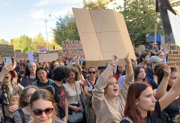 High school students hold placards as they demonstrate in the streets of Paris on Tuesday, October 6, 2026. Hundreds of thousands of students and their supporters took part in nationwide protests across France today to protest school conditions.  PAR20261006115 MAYAxVIDON-WHITE